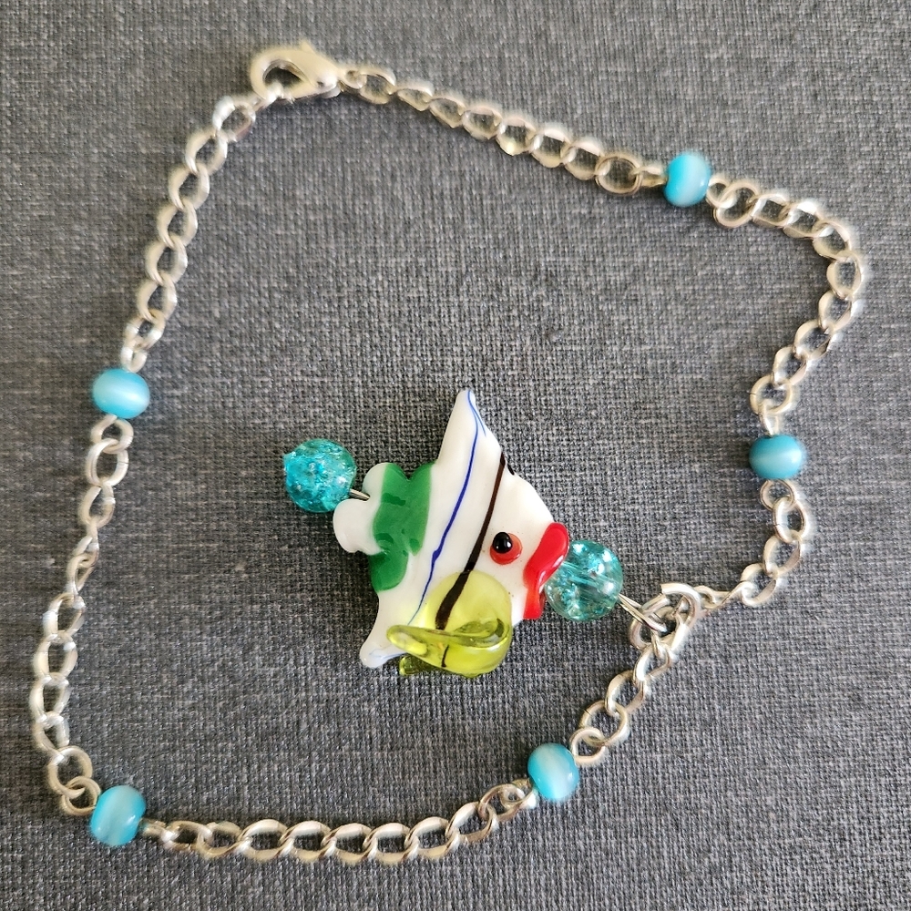 Angelfish charm bracelet with tiger's Eye and cracked glass beads